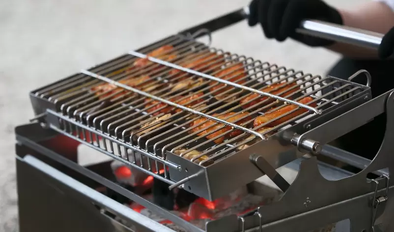 Grelha giratória para churrasco