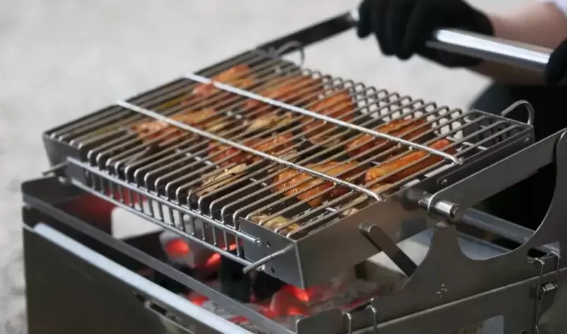 Grelha girat&oacute;ria port&aacute;til para churrasco - Fabrica&ccedil;&atilde;o OEM para marcas globais de produtos para camping.